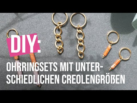 Schöne Ohrringe aus Perlen und Ketten