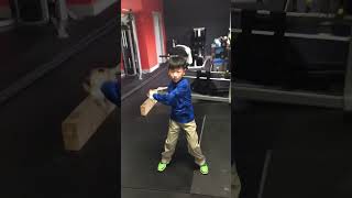 Age 6 illustrating one of our methods we use develop angular force coordination while having a blast
