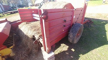 Hay rebaler from round bales to small square