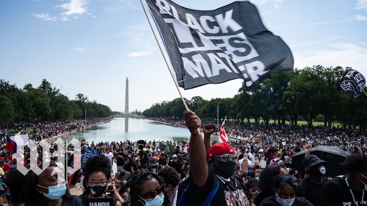 Thousands rally at the March on Washington: 'Just stop killing us'