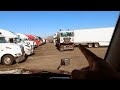 Truck Stop Backing Craziness!  Never Pull Behind Backing Trucks!