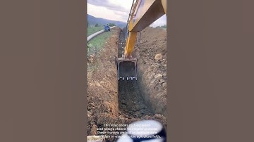 JCB Excavator: used to Dig a Irrigation Channel for Water Distribution