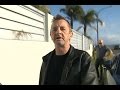 Phil Rudd flips out at cameraman after court appearance