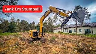 YANKING Stumps with the CAT 308 Excavator