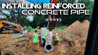 INSTALLING REINFORCED CONCRETE PIPE // Residential Excavating // Heavy Equipment Vlog Day 15 Part 2