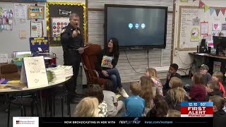 Volunteers read to 70 elementary classes as part of United Way QC Reading Day