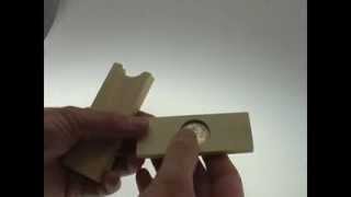 Solution for the Magic Coin Box from Puzzle Master Wood Puzzles