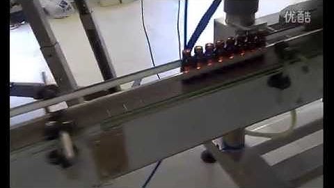 viscous liquid filling capping labeling machine video vial bottle filler capper labeler machinery