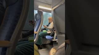 Distracted Train Rider Leaves Her Sandwich Dangling