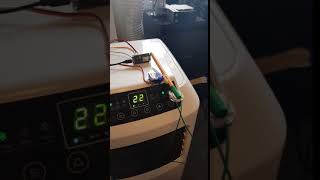 Spoofing a capacitive touch button with a servo motor