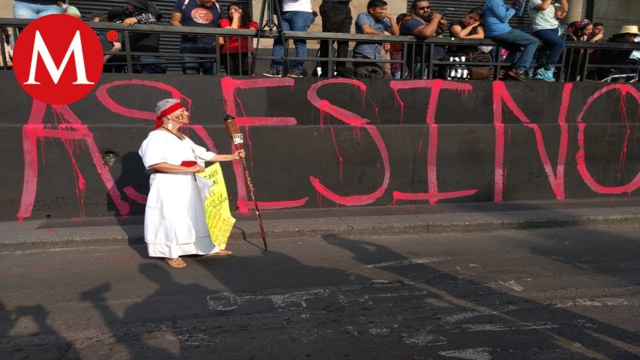 Dañaron 30 inmuebles y lesionaron a dos policías en marcha de Ayotzinapa milenio tv en vivo