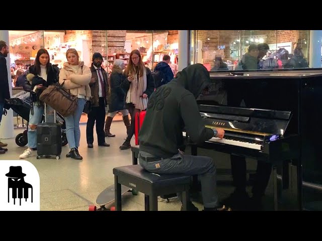Skateboarder in hoodie amazes public with sublime piano music class=