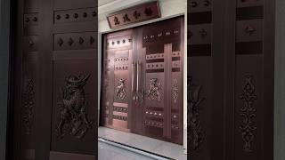 A beautifully crafted bronze door with 3D engraved patterns. #doors #metaldoor