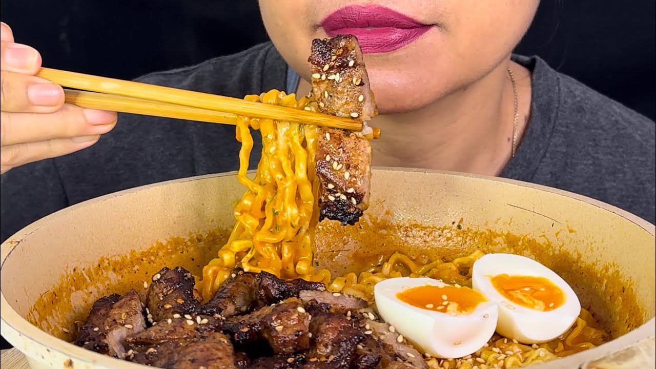 Grilled pork with fire noodles and eggs, what a combination of food, this is Asian 
