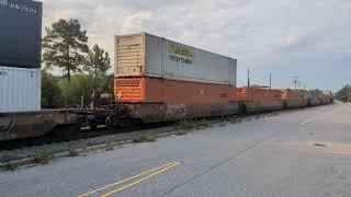 CSX 5484 and CSX 5310 lead a late Sunday evening sb intermodal train down Winslow Street 7/26/2026