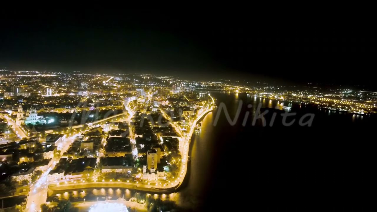 Astrakhan, Russia. Embankment of the Volga River. Night view of the city, Aerial View