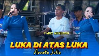A WOUND UPON A WOUND - ARNETA JULIA