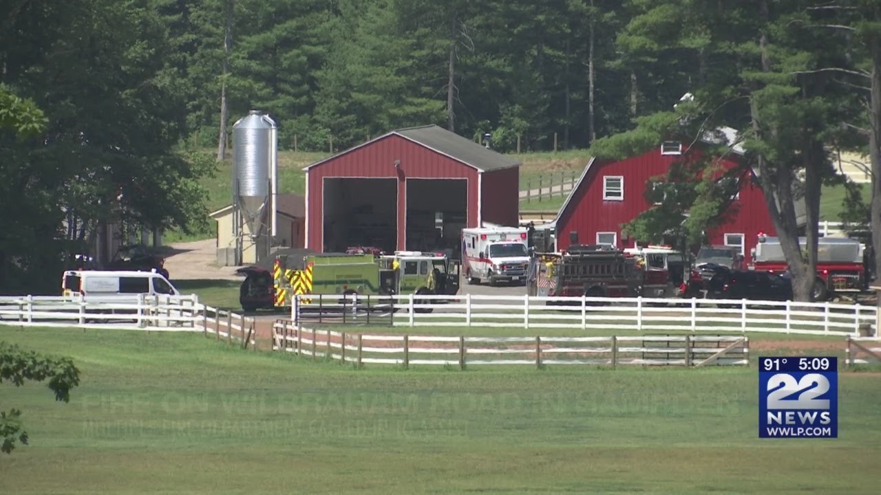 Multiple fire departments working to put out fire in Hampden