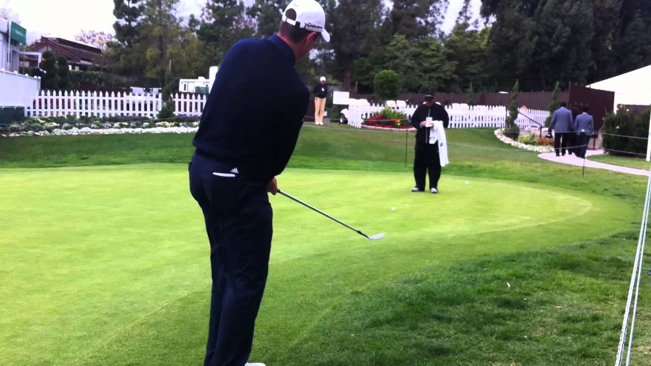 PGA Tour player Justin Rose chipping!  Close up!