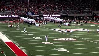 The arizona wildcat football team coming out onto field via new lowell
stevens tunnel.