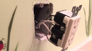 This is a video showing how to reconfigure a chain of bathroom GFI protected outlets. Originally only one GFI served two bathrooms. 