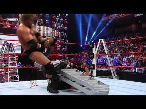 Triple H uses a ladder to help him apply the Figure Four on Kevin Nash: WWE TLC 2011