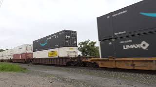 CSX Heritage unit leads eb stack train at willoughby oh