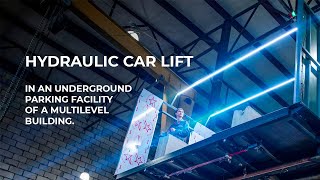 Hydraulic car lift in private underground parking