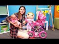 Kız oyunları.  Ayşe ve Lili bebeği Ela ile dışarı çıkma hazırlıkları yapıyor. Bebek bakma oyunu