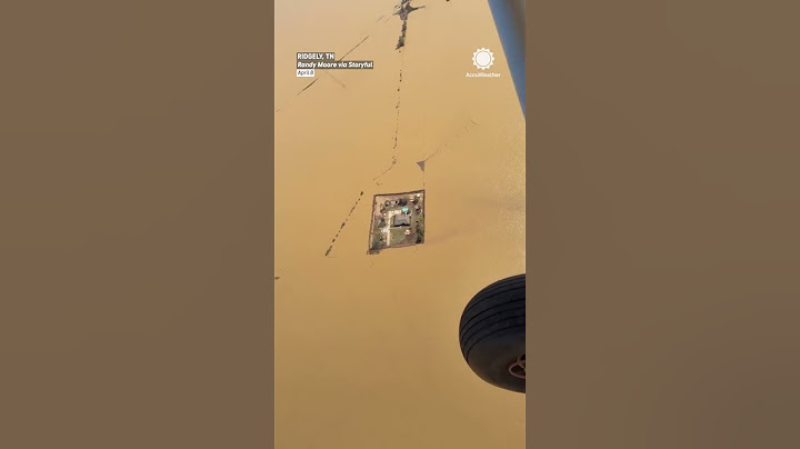 Tennessee Family Builds Levees to Save House From Flooding