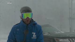 Seattle car slides down icy hill, hitting parked vehicles
