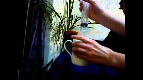 Feeding a cat through a tube  (esophagostomy tube)