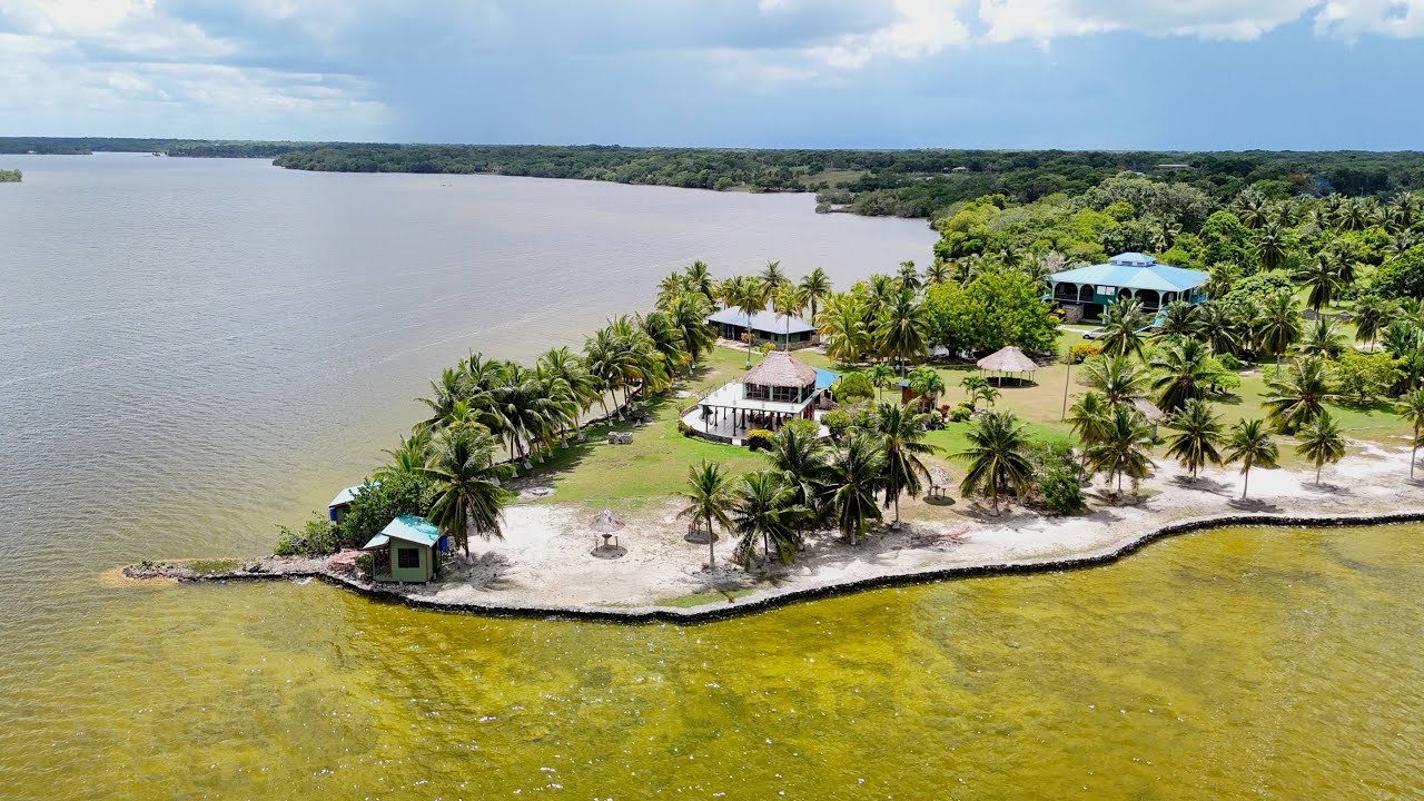 Own a Private Waterfront Estate in Belize | 1.8 Acres with Palapas, Cabins & Lagoon Views.