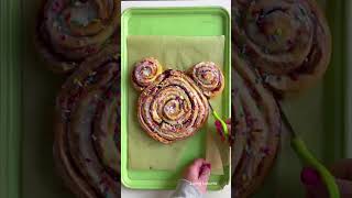 A Giant Mickey Cinnamon Roll is the perfect snack to celebrate a Disney trip! Cute Mickey Mouse part