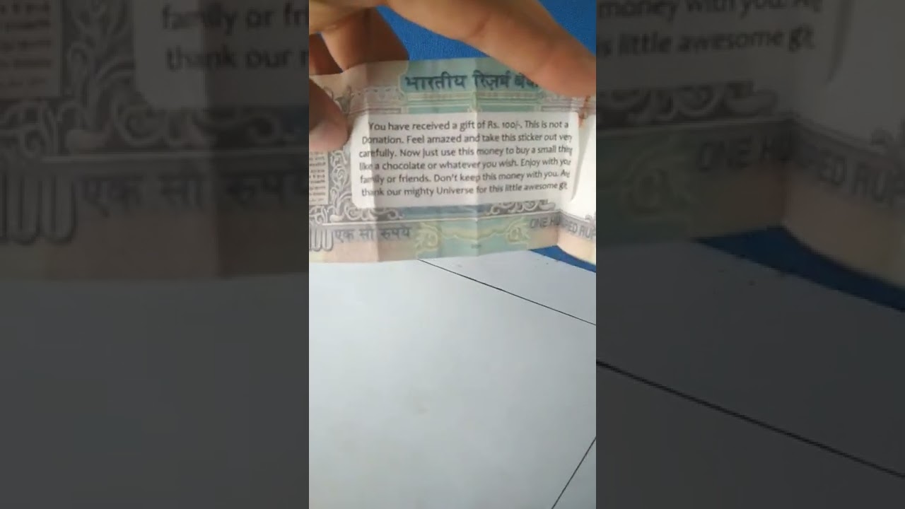 100 rs note in ATM space.