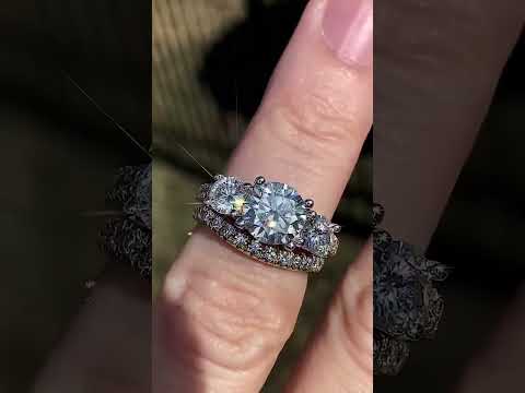 3.2ct (8mm/5mm) Round Brilliant Moissanite Trellis Three-Stone Ring ring video