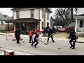 Watch These Cops Join Kids In A Game Of Street Hockey