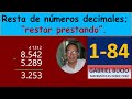 1-84 Resta de números decimales; restar prestando