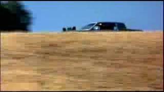 Cadillac Jumps Over Plane