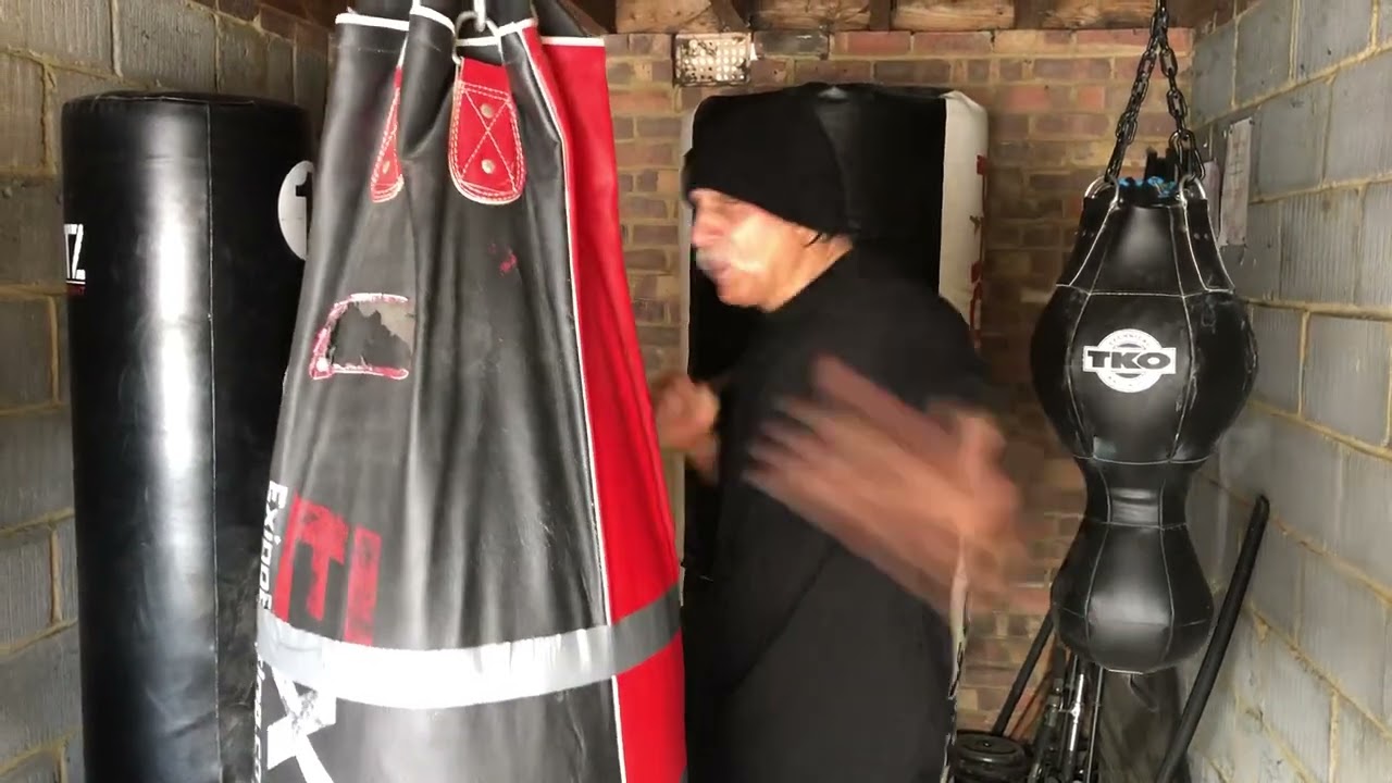 Iron Jab Cross Slap On The 6ft Bag With A Resistance Band