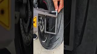 Laser Coding Machine Engraving Numbers Onto a Motorcycle Tire