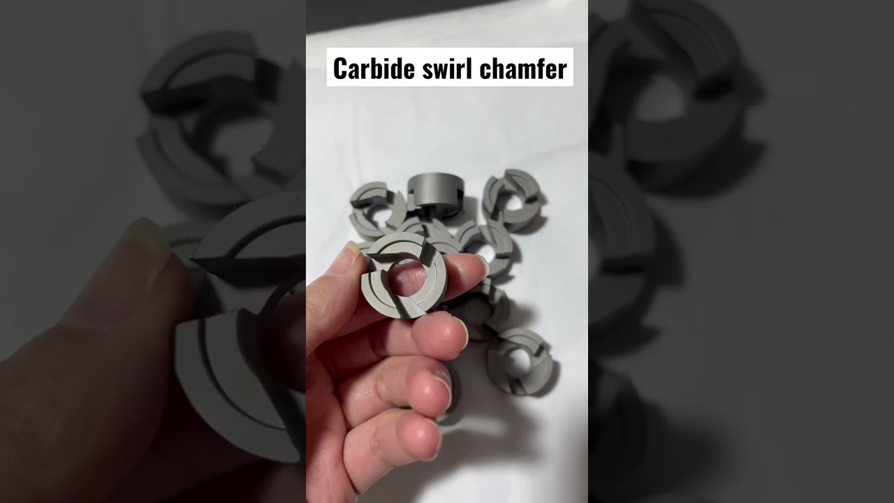 Tungsten carbide wear parts for spray nozzles. Carbide swirl chamfer and end plates.