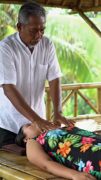 nature message therapy -caring husband helps wife relax after A long day