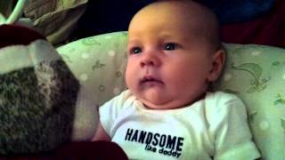 James loves his monkey rattle!