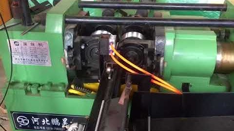Thread rolling machine with automatic feeder