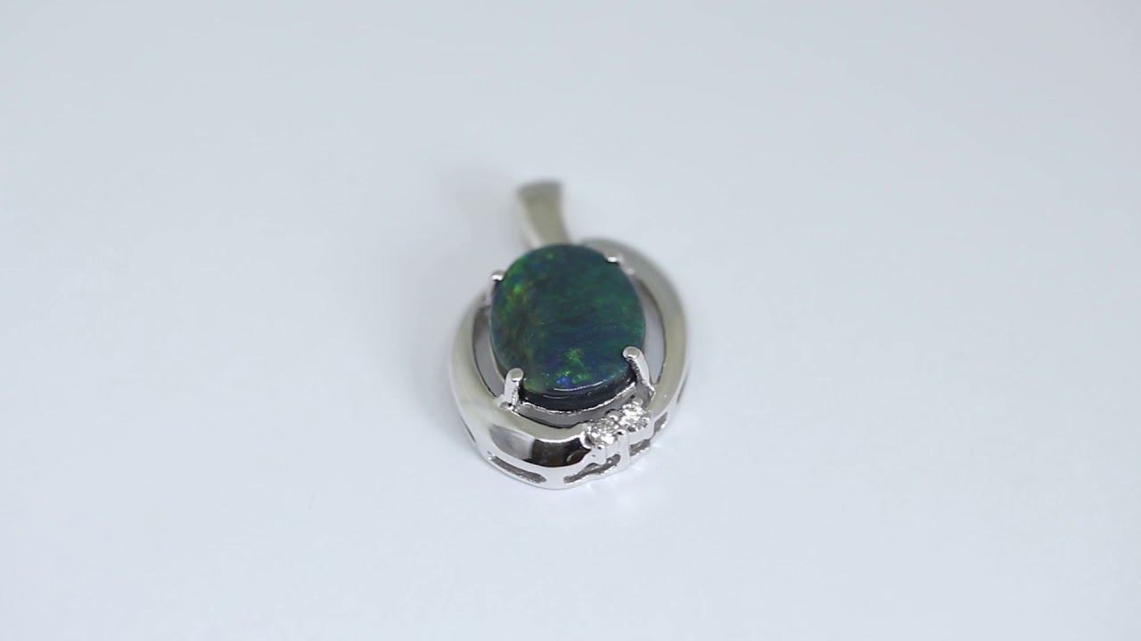 Natural solid black opal 2.37ct set in 18ct white gold