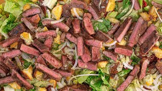 Homemade croutons + a creamy basil & blue cheese vinaigrette make
statement in rach's "steakment" steak salad.