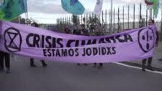 Activists protest outside venue of COP25 summit