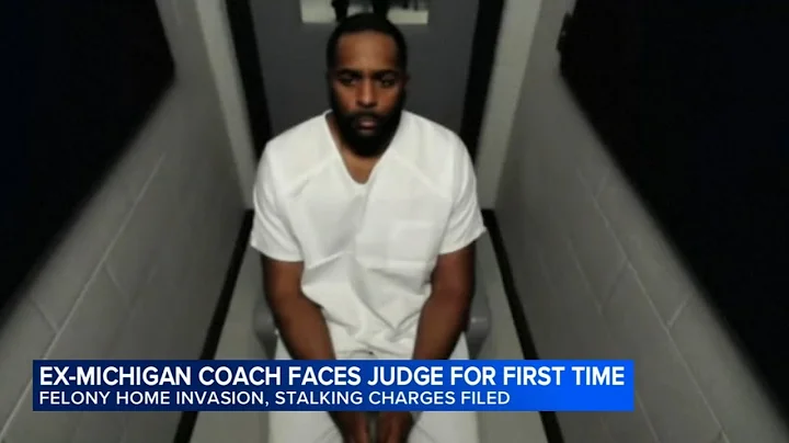 Fired Michigan football coach Sherrone Moore charged with home invasion, stalking, appears in court