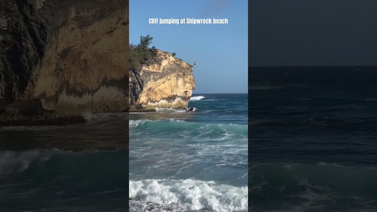 Cliff jumping at Shipwreck beach in Kauai HI